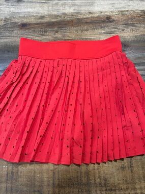 Thrive Red Pleated Mini Skirt with Star Cutout
